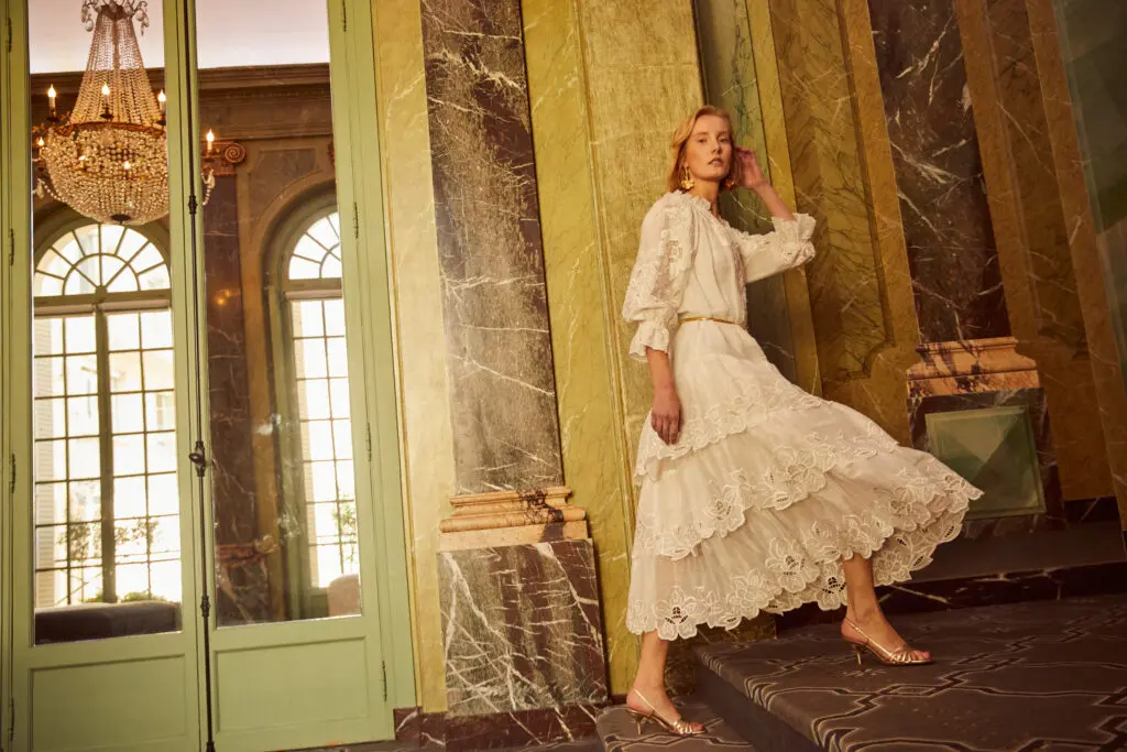 Layered to perfection, the Tamar Dress features intricate embroidery along the neckline, sleeves, and at the end of each flowing layer at the bottom of the dress. 