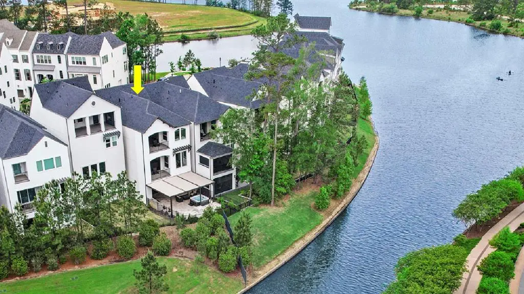 139 Vue Point Place is another home with serious waterfront views in The Woodlands.