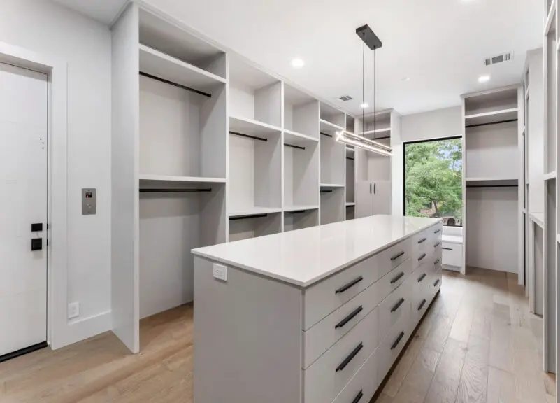 The closet at 114 S. Timber Top is wide open with lots of built-in functionality.