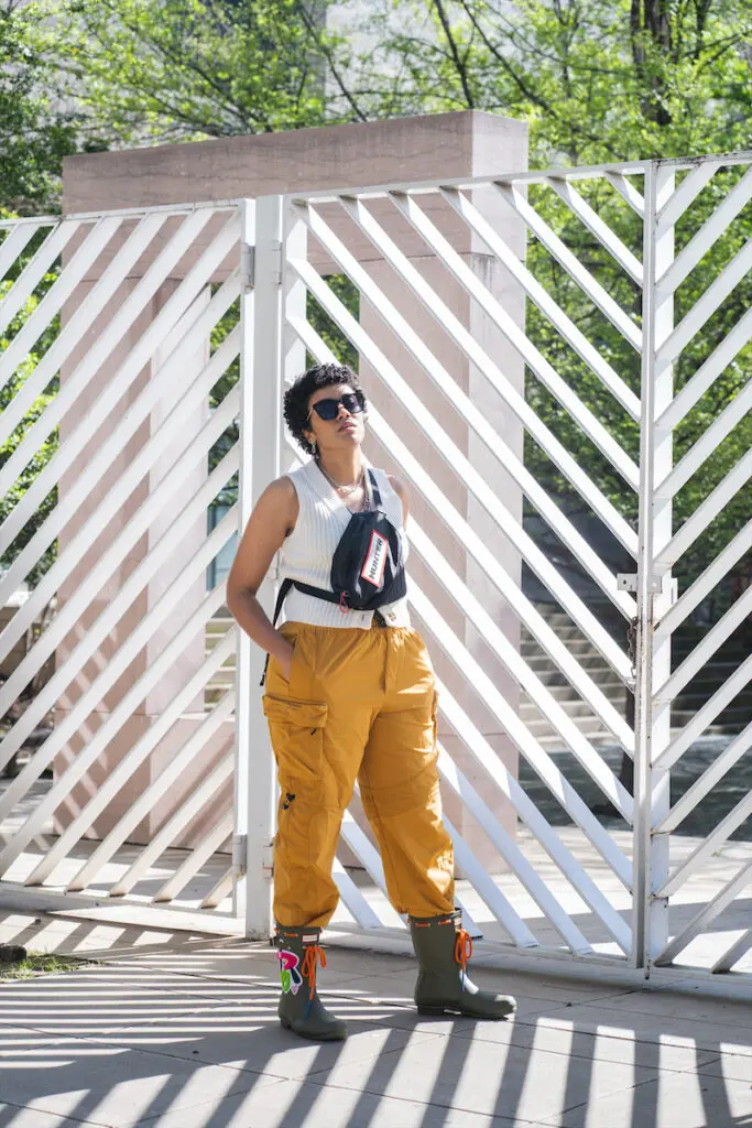 Sam Lao modeling her limited-edition Hunter Boot outside the Dallas Museum of Art. 