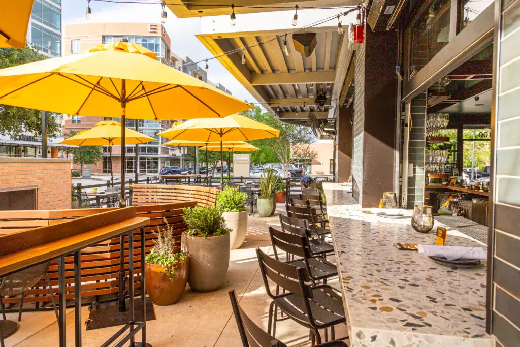 Postino Woodlands patio is bright and open to the interior. (Photo by Jenn Duncan)