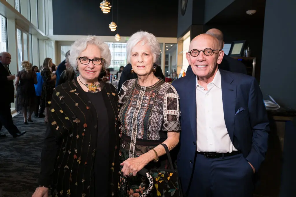 Beverly Postl, Judy Miller, Jim Postl at the Celebration of Reading. (Photo by Daniel Ortiz)