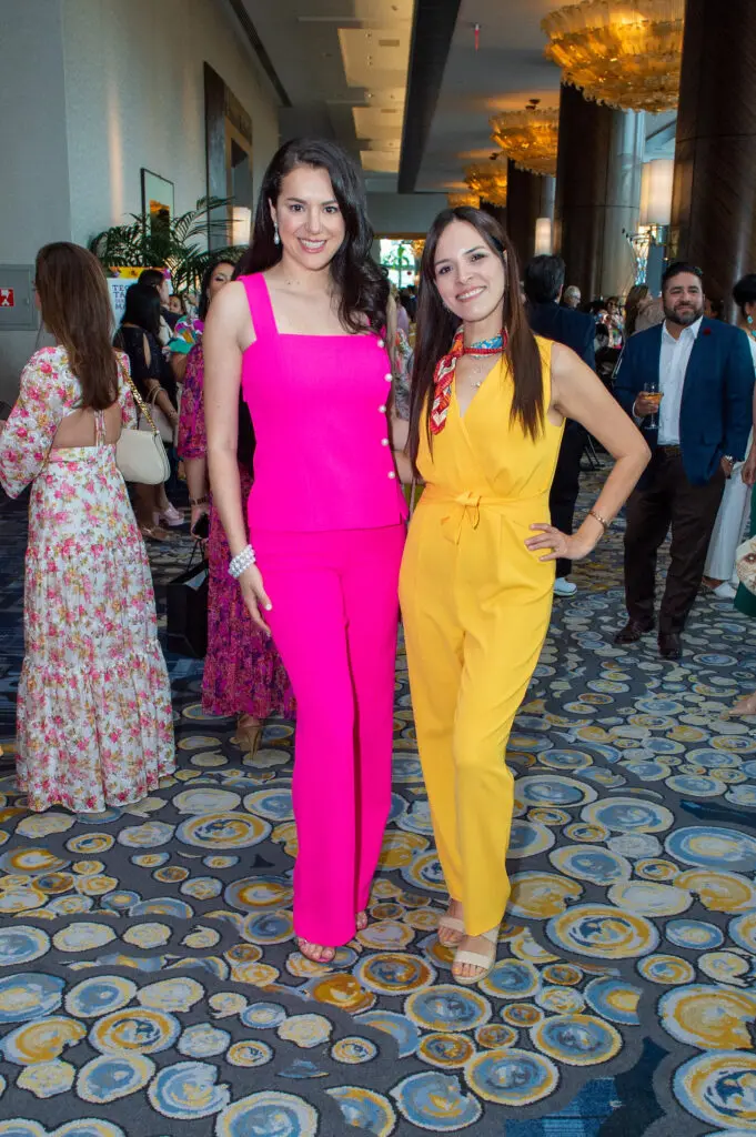 Cinthya Reade, Viri Leva at the Latin Women's Initiative fashion show and luncheon. (Photo by Jacob Power)
