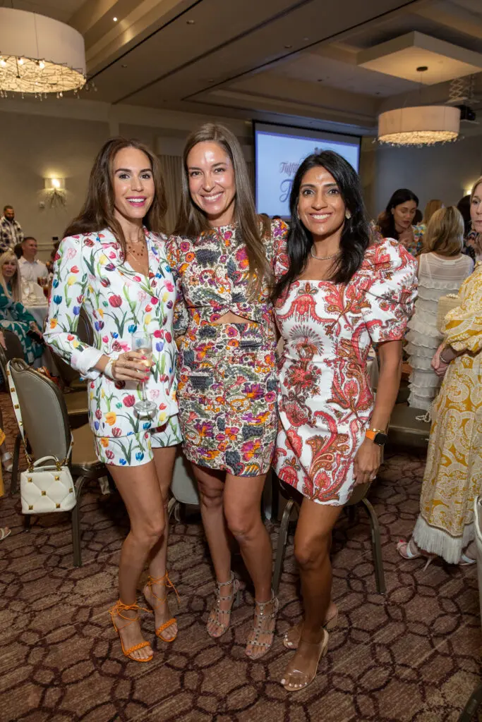 Colleen Difonzo-Lewis, Heather Safi, Rae Solberg at the Arms Wide luncheon. (Photo by Jenny Antill)