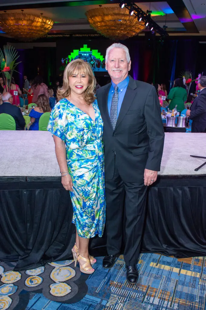 Cyndy Garza Roberts & Thomas Roberts at the Latin Women's Initiative fashion show and luncheon. (Photo by Jacob Power)