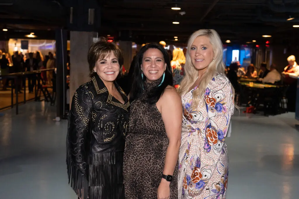 Hallie Vanderhider, Ana Ortiz, Genevieve Carter at the inaugural Victory Rally Ball (Photo by Wilson Parish)