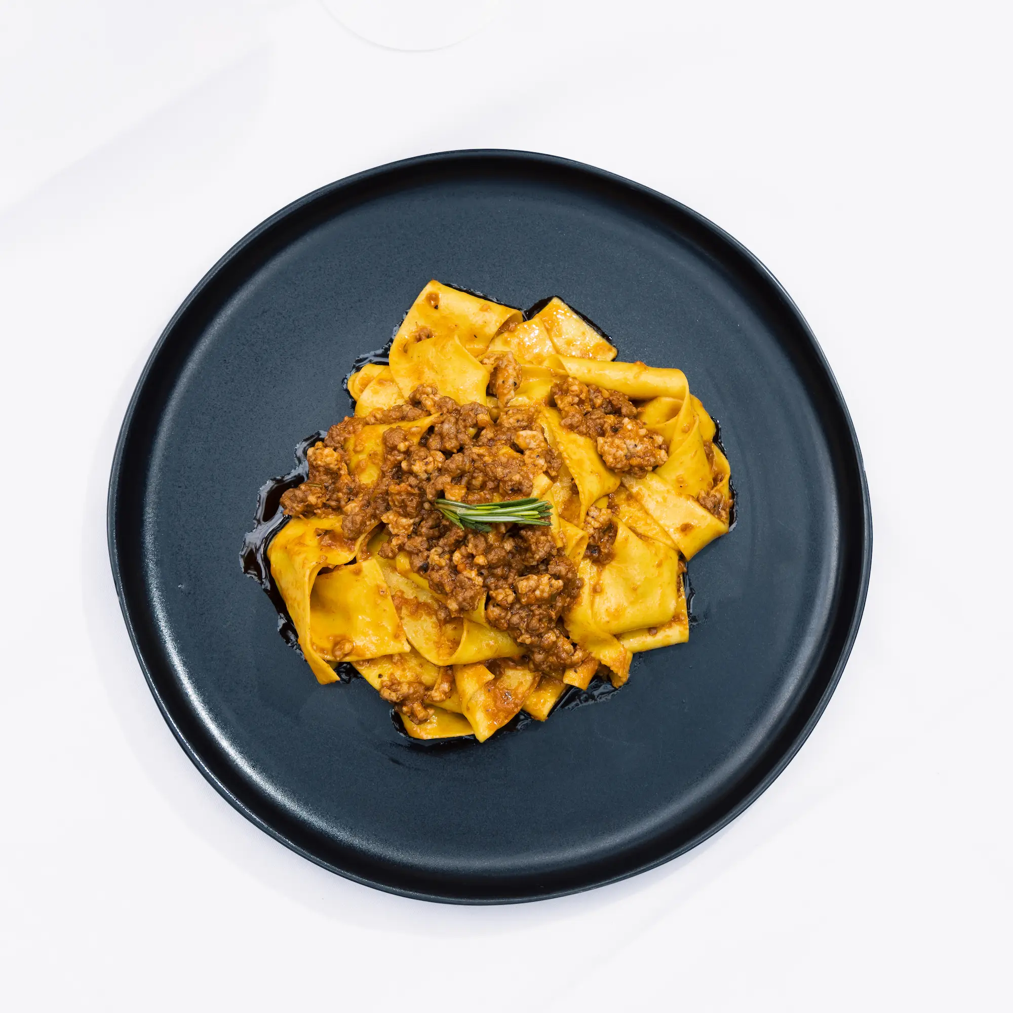 Pappardelle bolognese is one of a half dozen pasta dishes served at the new Dante's River Oaks. (Photo by Bear Media Co.)