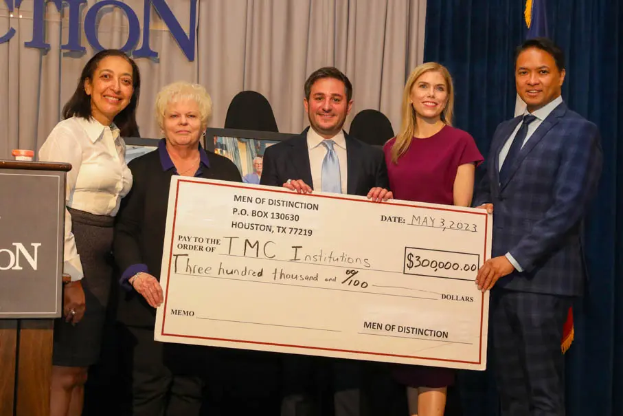 Drs. Omaima Sabek, Joan Nichols, Dr. John Cangelosi, Shane Morris, at the Men of Distinction awards luncheon. (Photo by Priscilla Dickson)