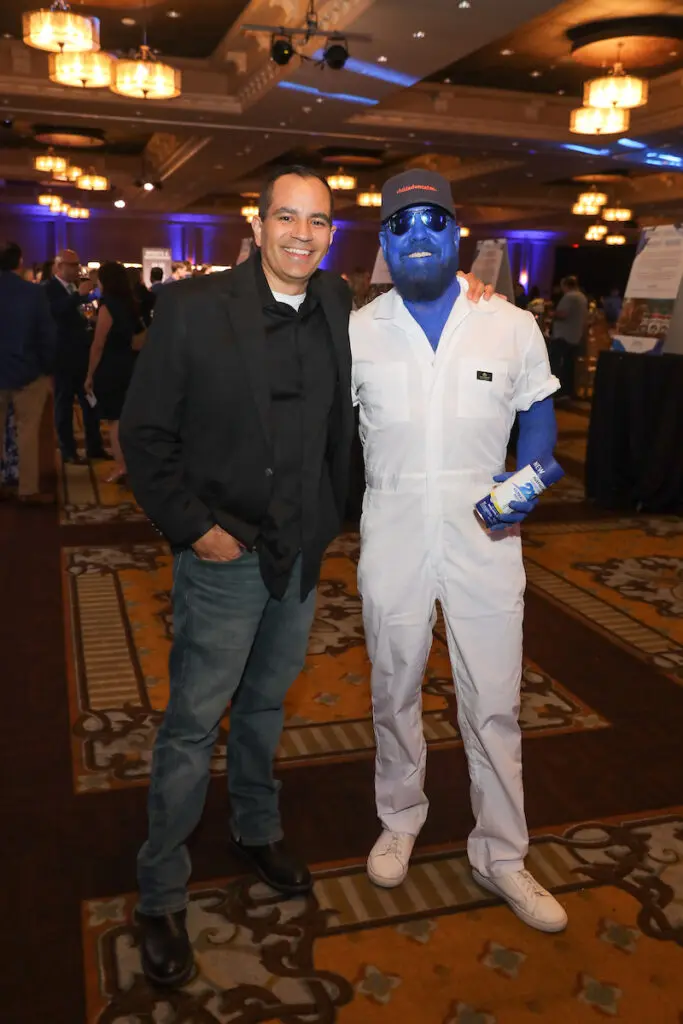 Eric Tonsul and Kelly Hawkins in commemorative blue body paint at the Child Advocates benefit dinner.  (Photo by Priscilla Dickson)