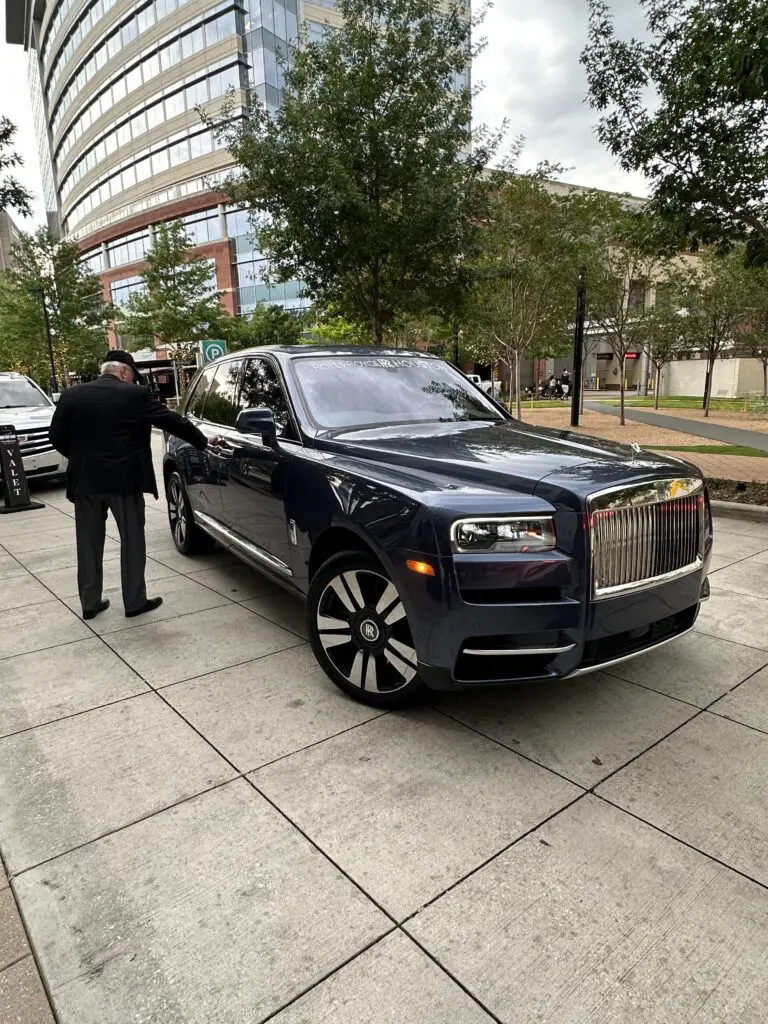 Our chariot, the Post Oak Motor Cars Rolls-Royce Cullinan, awaits at the PaperCity The Woodlands launch party (Photo by Shelby Hodge)