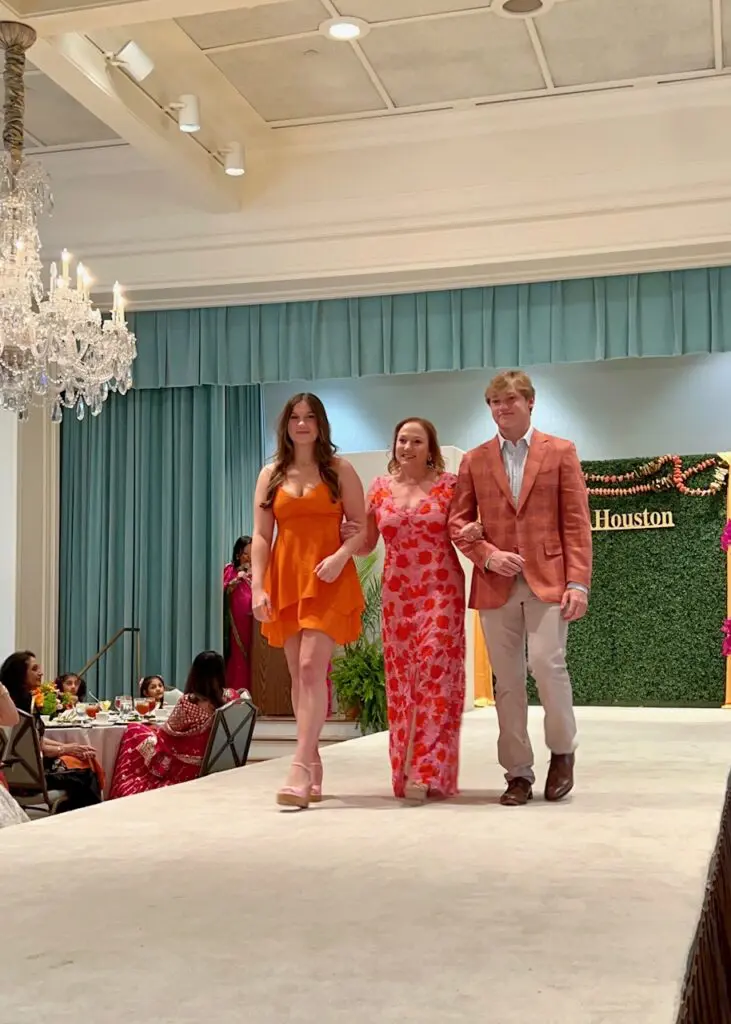 Honoree Mignon Gill escorted by daughter Alexandra and son Stephen at the International Mothers Day 10th anniversary celebration (Photo by Quy Tran)