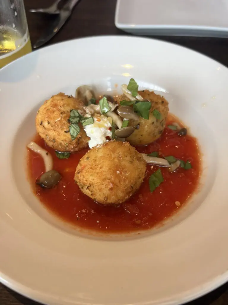 One of Barsotti's new menu items, Arancini Pizzaioli, is a can't-miss starter. (Photo by Megan Ziots)