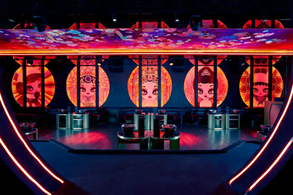 Pop art murals by artist Mari Kim line the walls of Komodo's upstairs lounge in Dallas.(Photo by Kevin Marple)