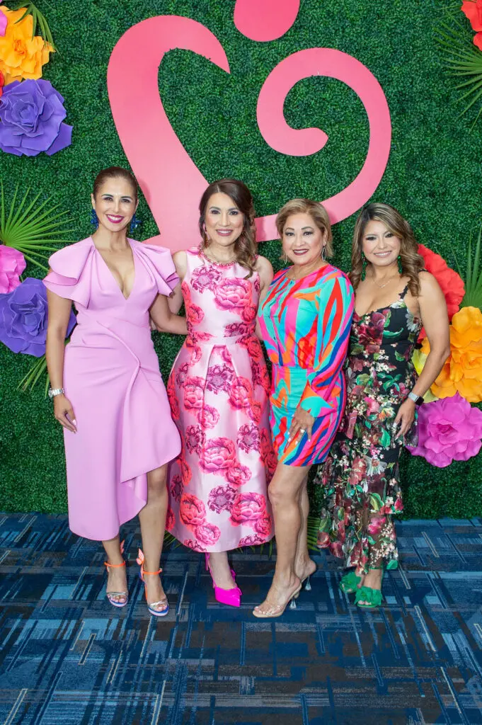 Laura Salinas Pruneda, Isela Garcia, Jacklyne Lewis, Sonia Padilla at the Latin Women's Initiative fashion show and luncheon. (Photo by Jacob Power)