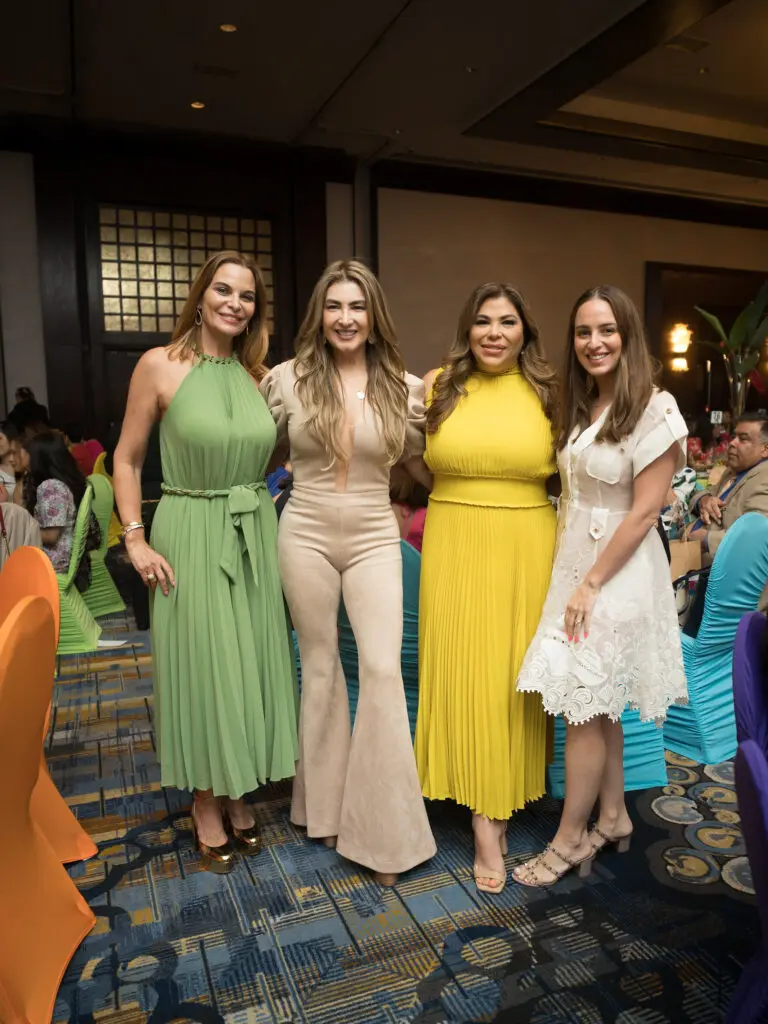 Michelin Newall, Andrea Gomez Patricia Moya,Michelin Schloeter at the Latin Women's Initiative fashion show and luncheon. (Photo by Daniel Ortiz)