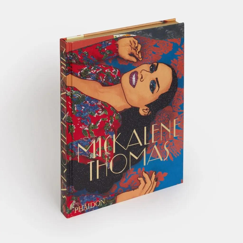 This Mickalene Thomas book, signed by the artist for Houston artist Lovie Olivia and her artist partner Preetika Rajgariah, was mentioned in a 2022 Architectural Digest article on the couple.