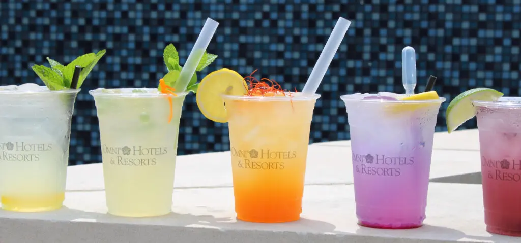 Sip on a refreshing cocktail while taking in the city skyline as your backdrop.