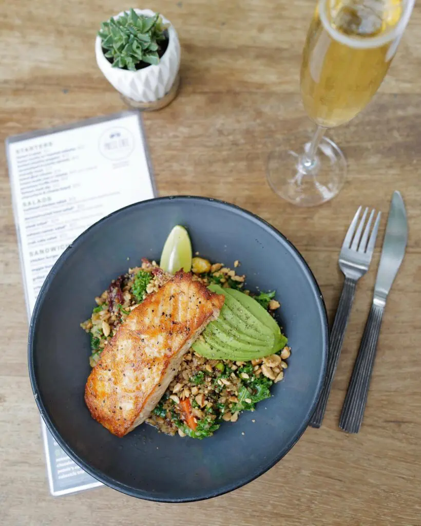 Ancient grains bowl topped with seared salmon. What a dish.