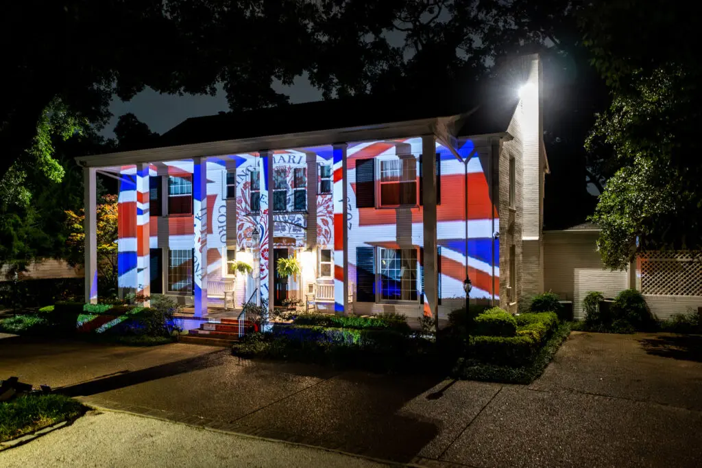 In honor of King Charles' coronation the British Consul General's residence in River Oaks was dressed in a patriotic light show. (Photo by  Joffre Camacho, Square Foot Photography)