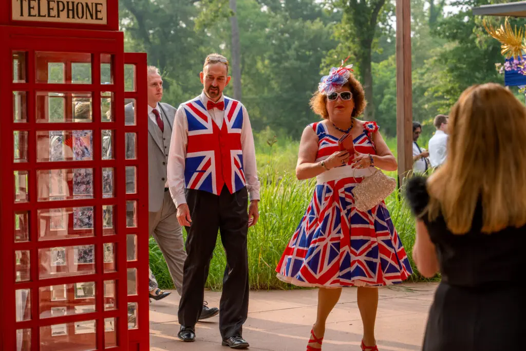 Loyal costuming at the British Consulate's party celebrating King Charles' coronation. (Photo by  Joffre Camacho, Square Foot Photography)