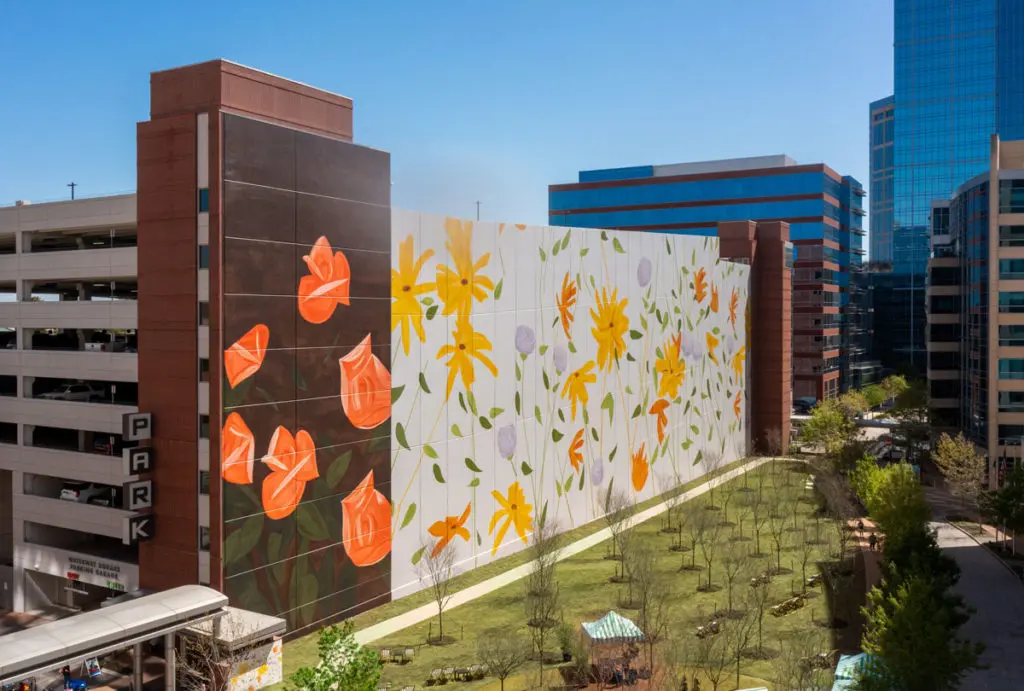 Alex Katz's The Flowers takes up an entire wall in The Waterway. It is one of the public art wonders you can find in The Woodlands. (Photo courtesy of TWAC)