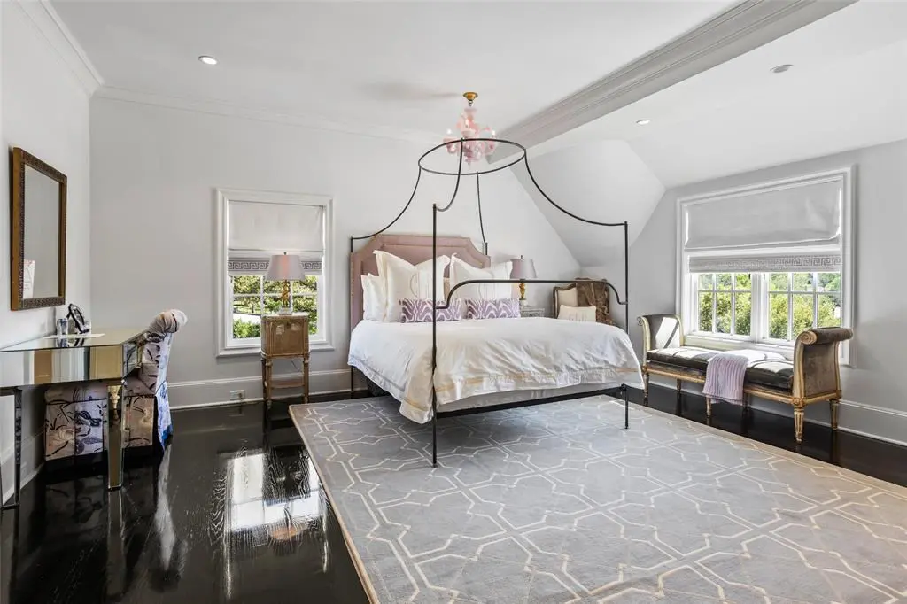 One of the other upstairs bedrooms flooded with natural light at 5700 Westover Court.
