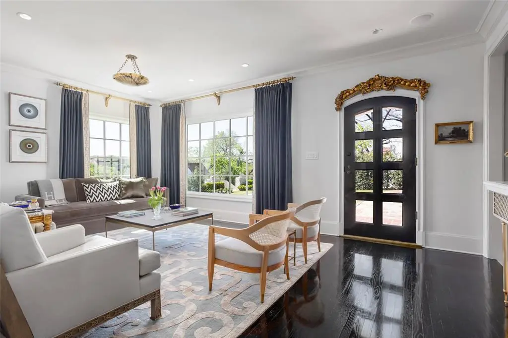 The main entry reveals the black lacquered wood flooring that graces many rooms.