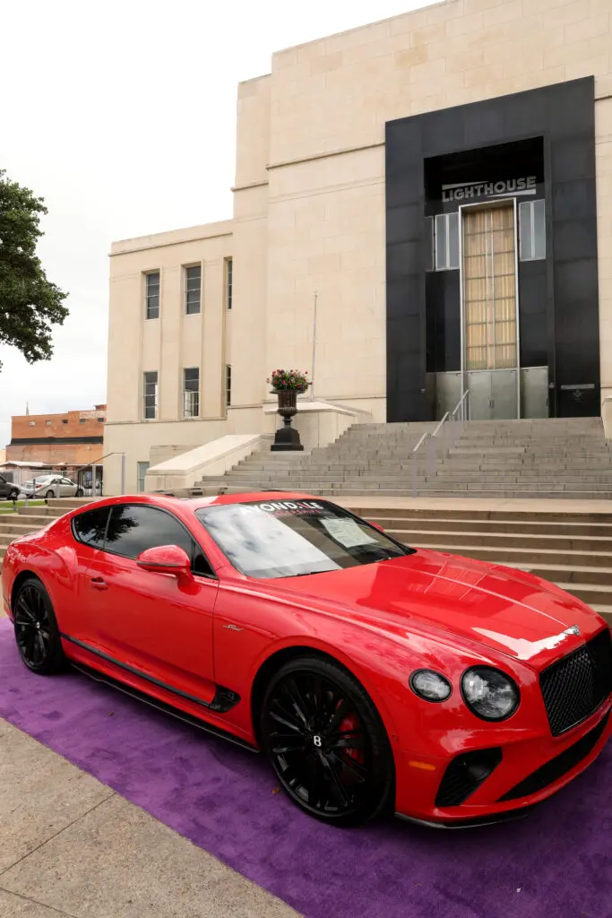 A Bentley out front of downtown Dallas' Lighthouse ArtSpace for AWARE Affair (Photo by Lisa Stewart and Rob Wythe/Wythe Portrait Studio)