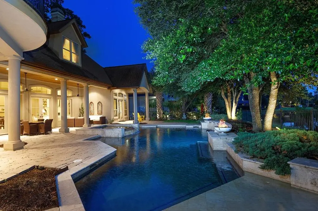 The stylish backyard pool at 111 W Ambassador Bend is one of the finest in The Woodlands right now.
