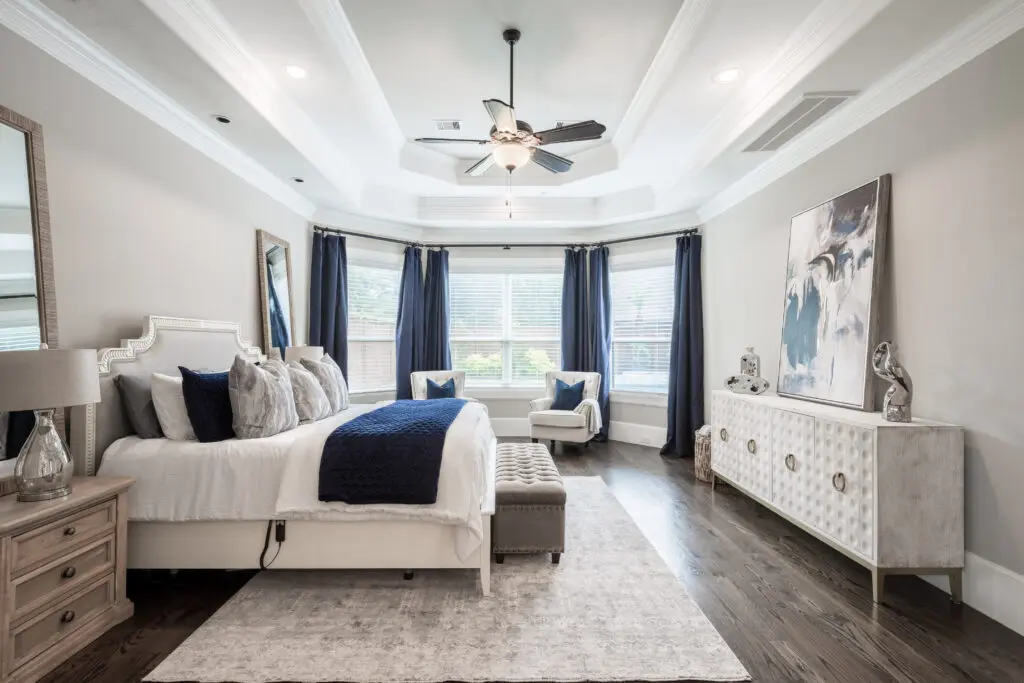 Natural light floods the primary, first floor bedroom. (Photo by Ambia Photography)