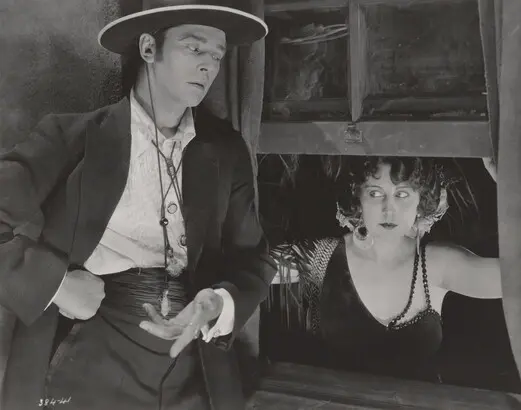 Karl Struss (1886 to 1981); [Theodore Kodloff beckoning Dorothy Dalton through open window, "Fool's Paradise"]; 1920; Gelatin silver print; Amon Carter Museum of American Art, Fort Worth.