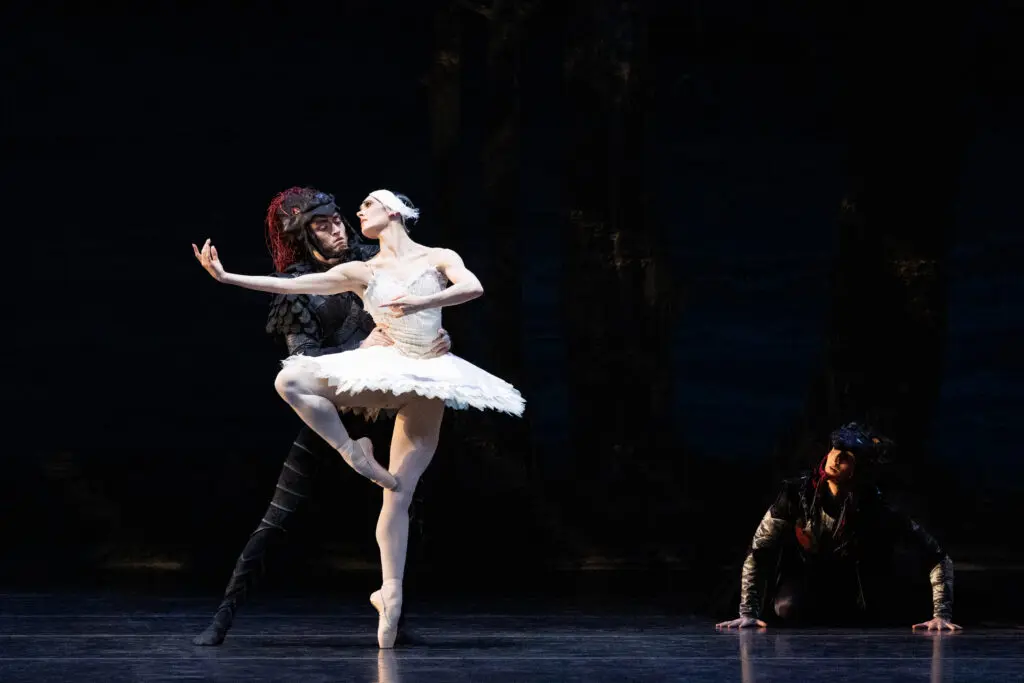 Houston Ballet Principal Beckanne Sisk as Odette and Corps de Ballet dancer Riley McMurray as Rothbart in Stanton Welch’s Swan Lake 
(Photo by Lawrence Elizabeth Knox. Courtesy Houston Ballet)