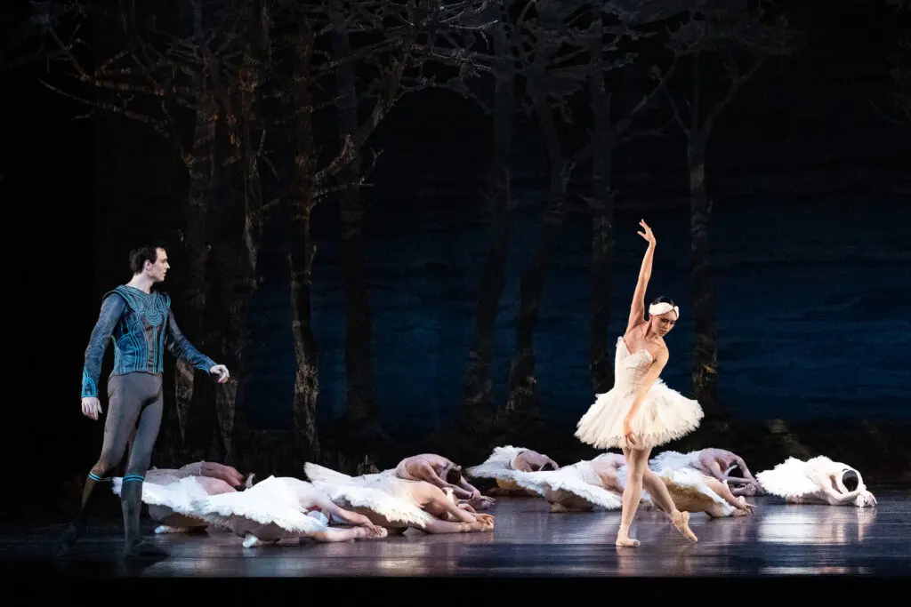 Houston Ballet Principal Chase O’Connell as Prince Siegfried and Corps de Ballet dancer Danbi Kim with Artists of Houston Ballet in Stanton Welch’s Swan Lake. (Photo by Lawrence Elizabeth Knox. Courtesy of Houston Ballet)