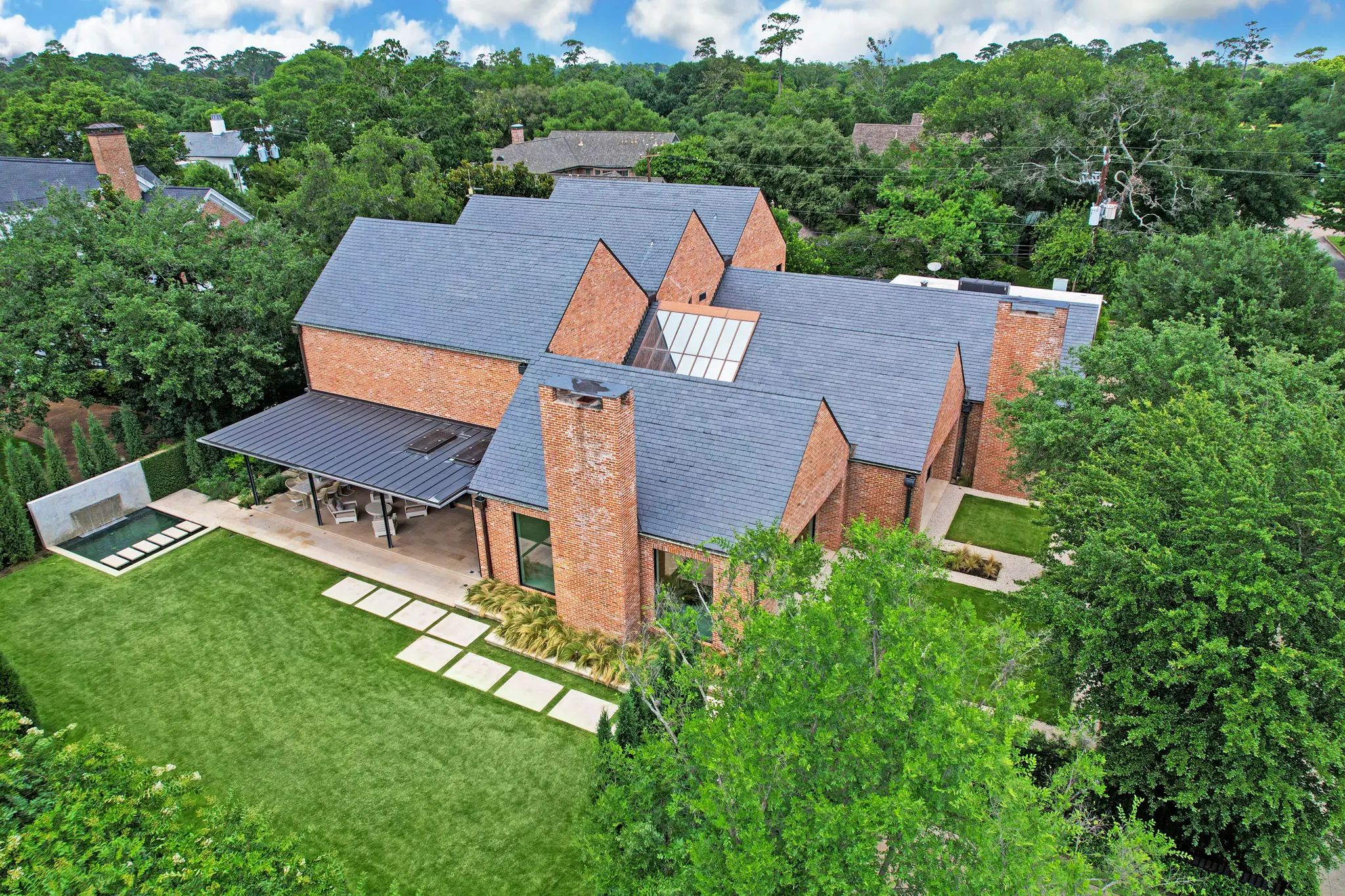 The River Oaks home at 3404 Chevy Chase was designed by renowned architect S.I. Morris for construction mogul Leo Linbeck Jr. It is on the market with Greenwood King Properties.