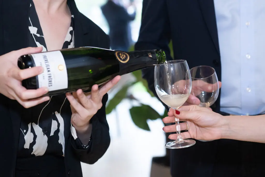 Bubbly is poured at the BeDESIGN fête introducing Sorellina Rooftop and Frerejean Frères champagne.