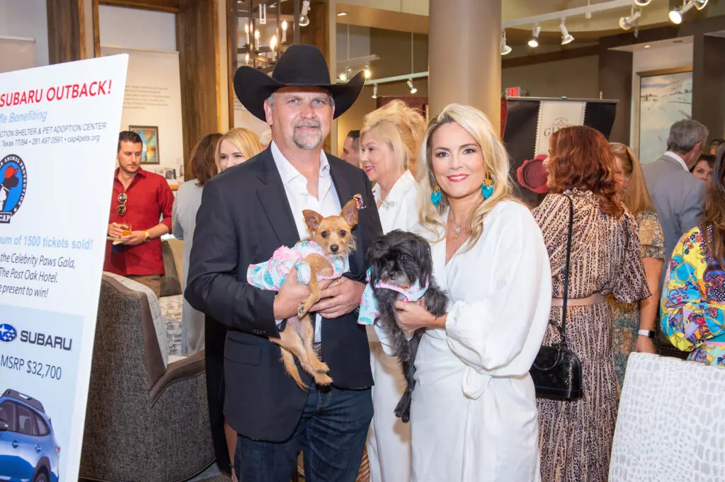Greg Cook & Dr. Roxy Riefkohl with Olive Marie and Ruby at the Citizens for Animal Protection Celebrity Paws Gala launch party (Photo by Jacob Power) (Photo by Jacob Power)