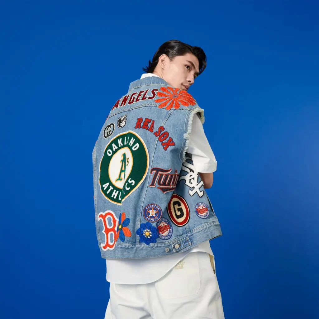 Gucci embraces baseball fever with casual wear celebrating top MLB teams. Look close and you can see the Astros logo on the vest.