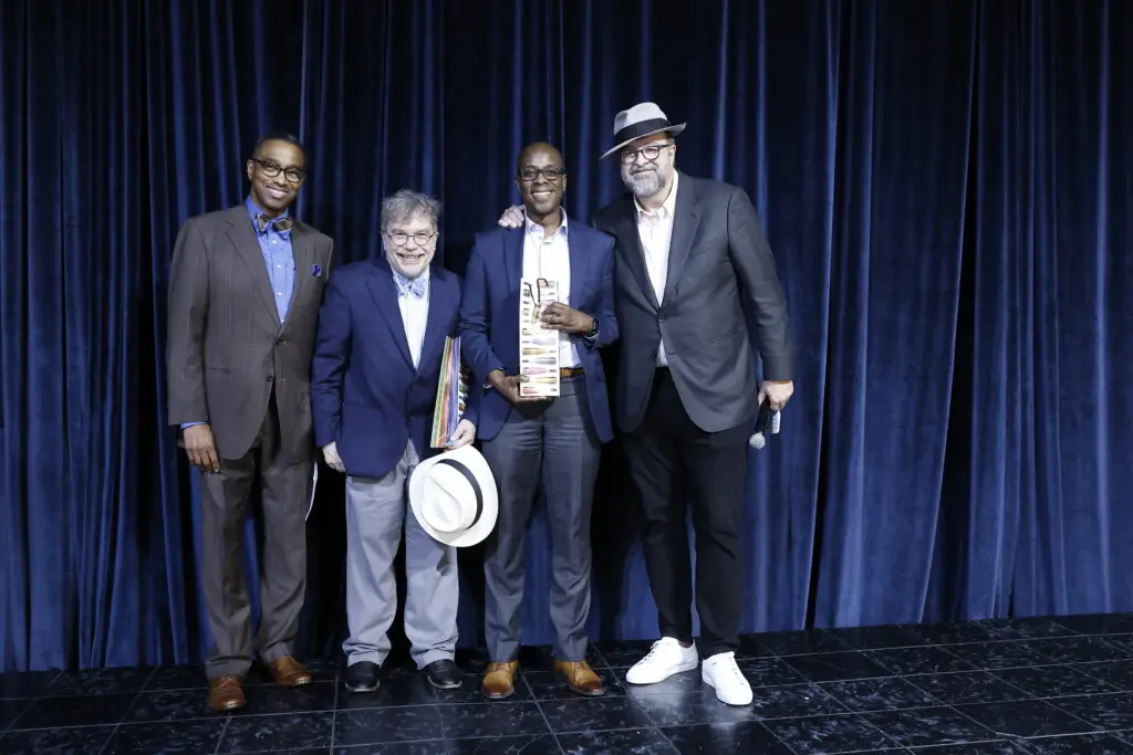 Khambrel Marshall, honorary chairs Dr. Peter Hotez and Dr. Jean Raphael, Bob Sanborn at The Big Brunch benefiting Children at Risk (Photo by Quy Tran)