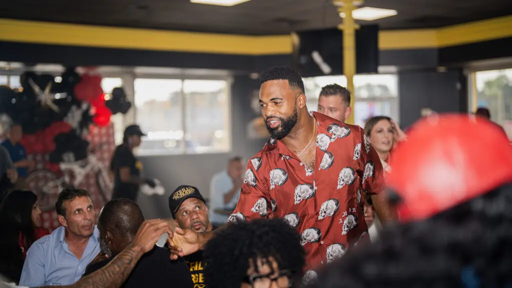 NFL Linebacker turned entrepreneur Darryl Sharpton at the preview of Bun B's soon to open Trill Burgers brick and mortar hot spot. (Photo by Mark Champion)