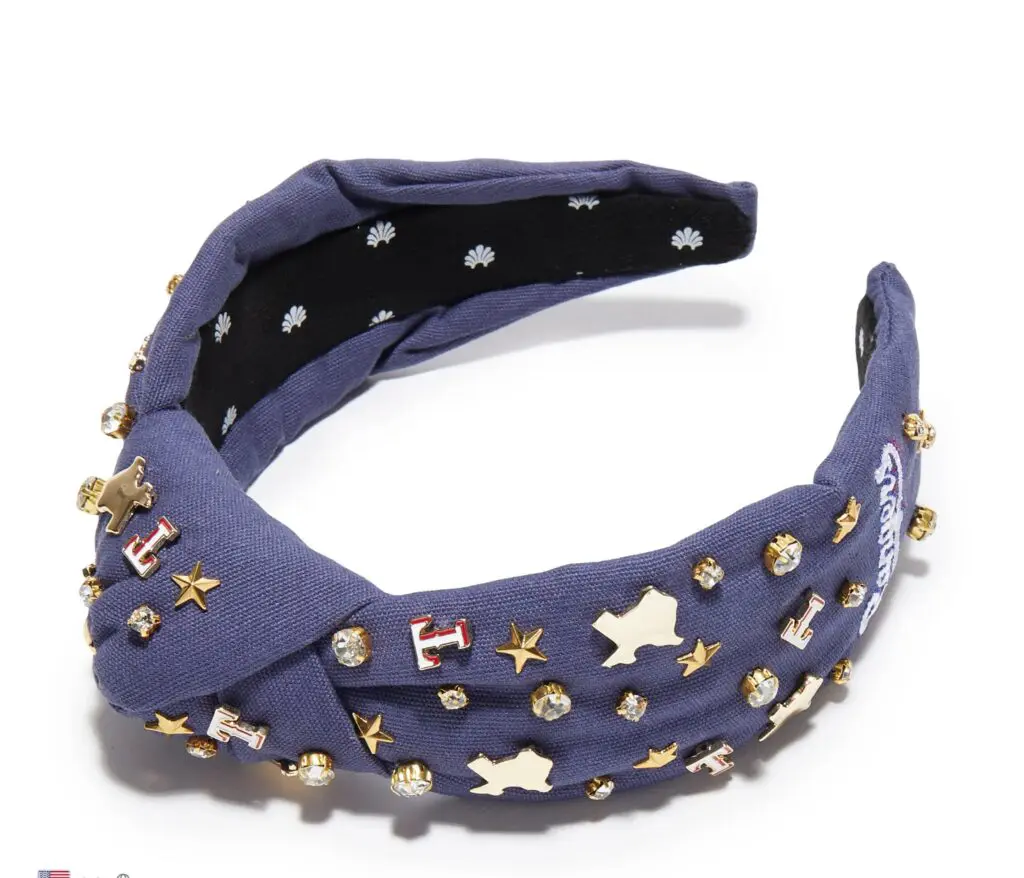 Beads and pearls decorate the Lele Sadoughi headband salute to the Texas Rangers.