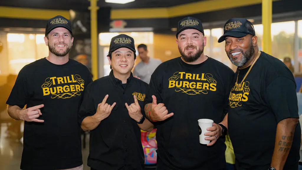 Trill Burgers partners Nick Scurfield, Mike Pham, Fernando Valladares with Bun B at the preview of Bun B's soon to open Trill Burgers brick and mortar hot spot. (Photo by Mark Champion)