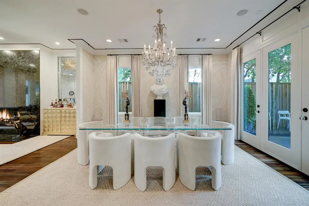 The formal dining room in the luxurious 'Tuscan Villa' townhome at 5722 Logan Lane (Photo by TK Images/Compass)
