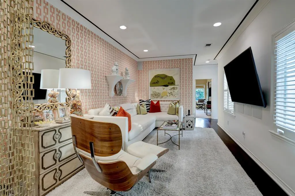 The sitting room in the luxurious 'Tuscan Villa' townhome at 5722 Logan Lane (Photo by TK Images/Compass)