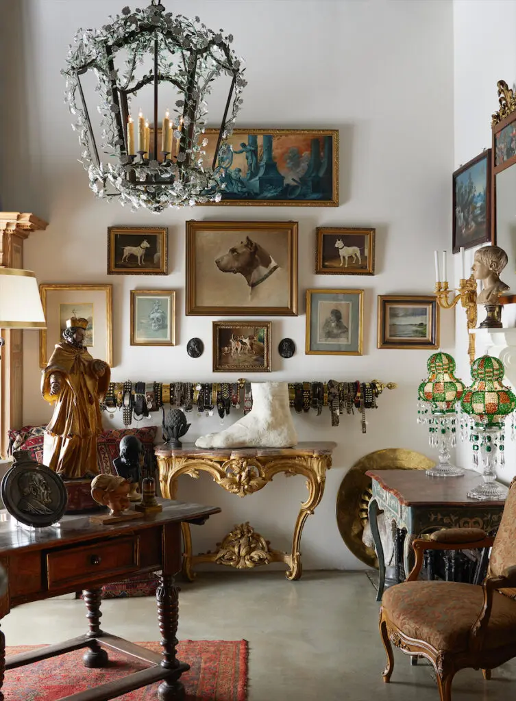 Mid-20th-century German tole floral lantern;
collection of 18th-and-19th-century dog collars;
Louis XV giltwood console. (Photo by Kris Ellis)