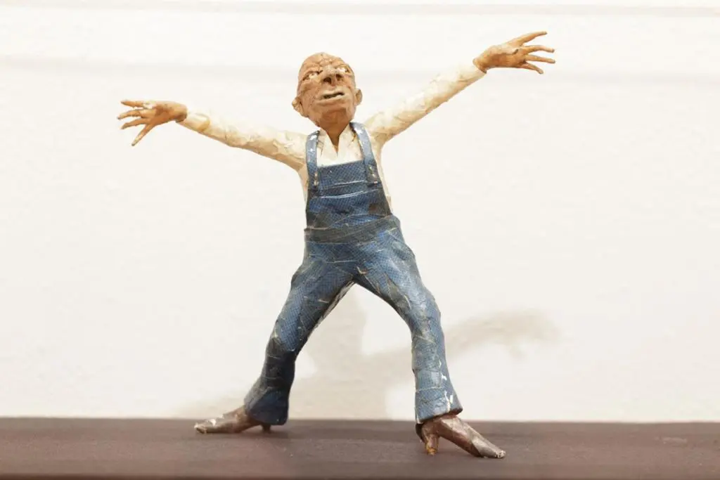 Jesse Lott's expressive papier-mâché sculpture from the "Men in Overalls" series. Papier-mâché was just one of the materials Lott often employed. (Courtesy Station Museum of Contemporary Art, Houston)