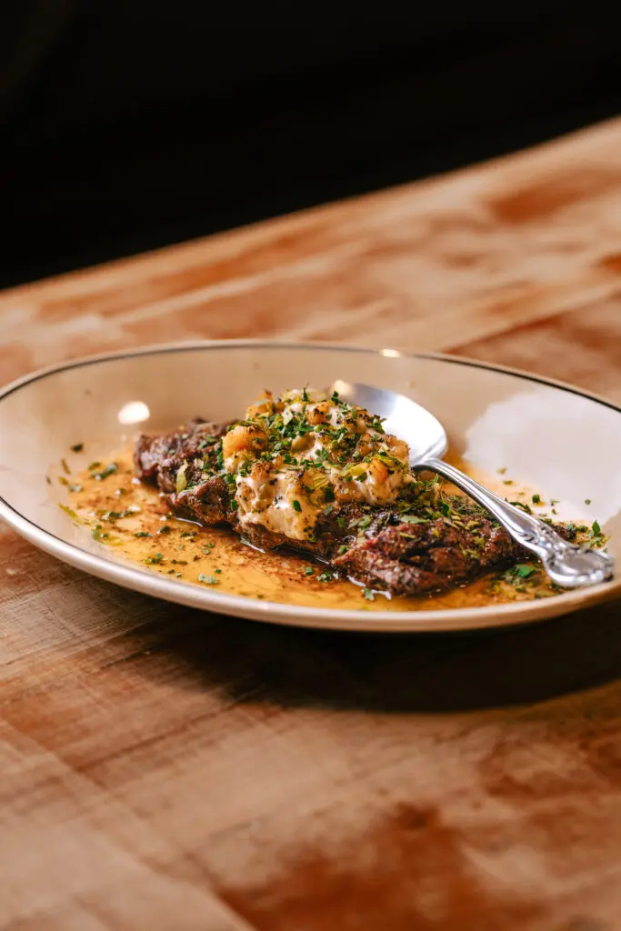 Grilled redfish on the half shell with chermuola is served at the new Gulf Coast restaurant called Josephine's in Midtown. (Photo by  Ally Hardgrave )