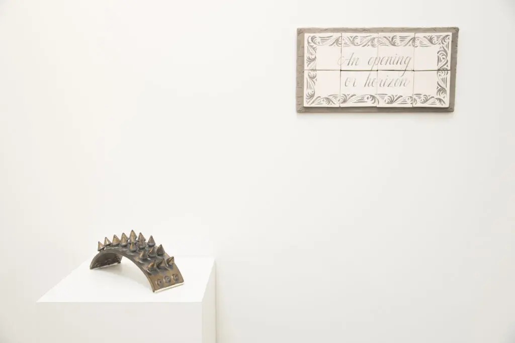 "Bridge II" and "Street sign" by Tamara Santibañez at "I, Ruby: Vol. 1" 
 (Photo by Hung Ngo)
