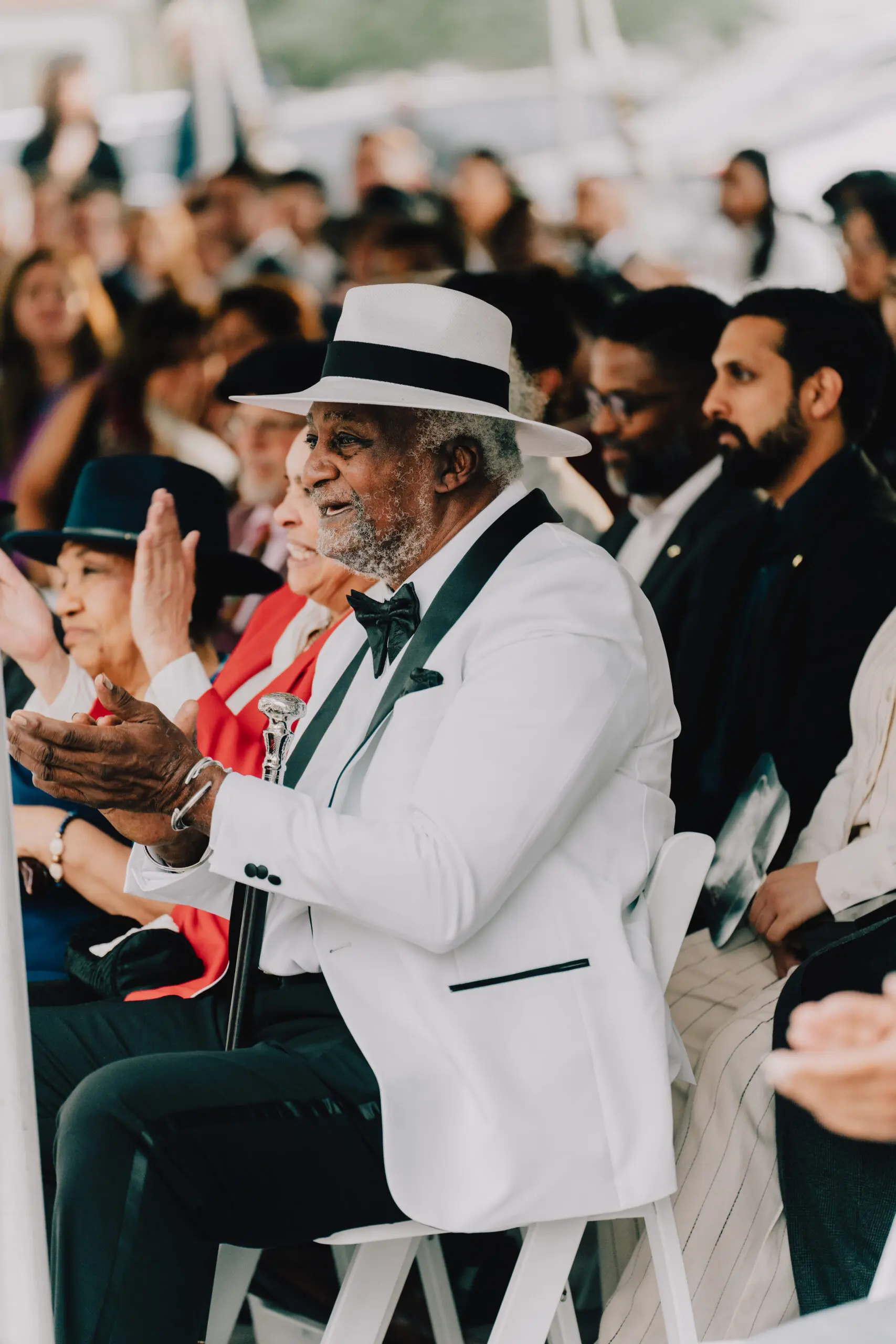 Artist Jesse Lott enjoys the festivities during the unveiling of the recently renovated Eldorado Ballroom, which is part of Project Row Houses. The event coincided with Lott's 80th birthday. (Photo by THE 3NGINE. Courtesy Project Row Houses, Houston)