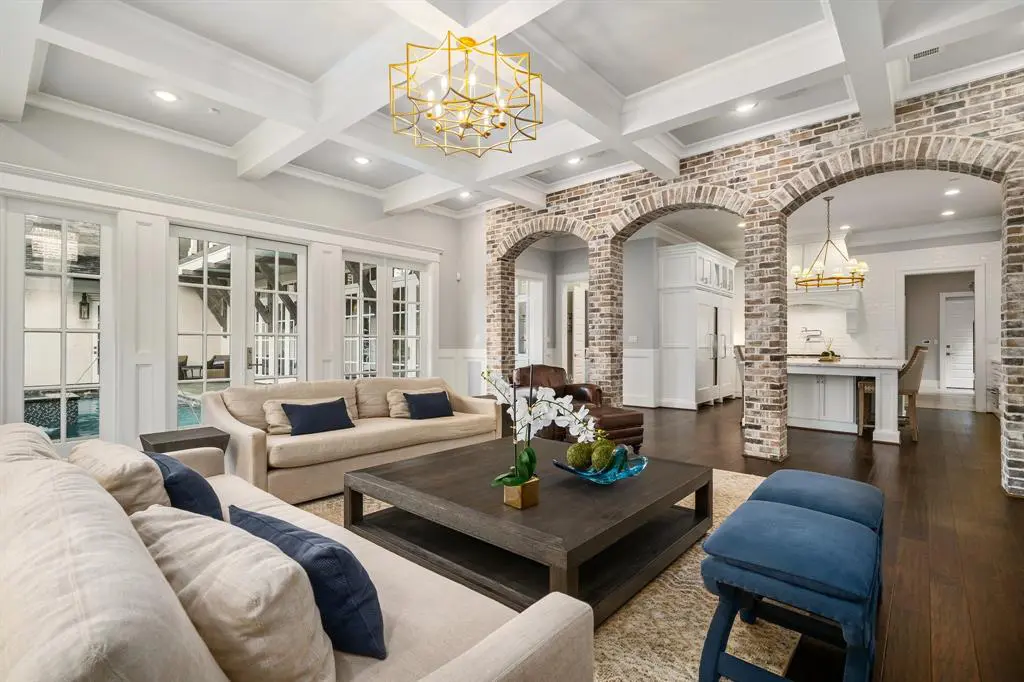The living spaces are filled with rustic charm and brick accents. 