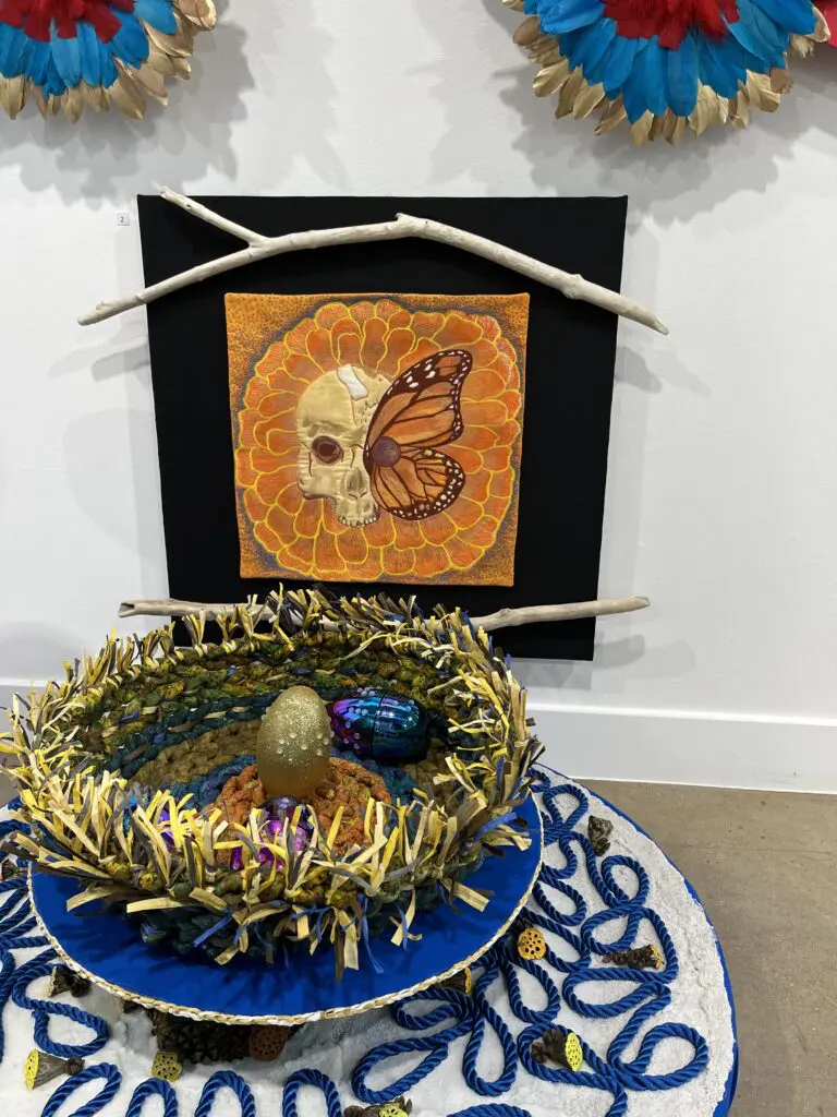 Nancy Ofori's "RE," 2023, features an interactive phoenix habitat and plastic eggs adorned with braille  (Photo by Brittany Ellis)